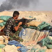 Irak'ta bir Şii milis grup daha silah envanterini hükümete teslim etti